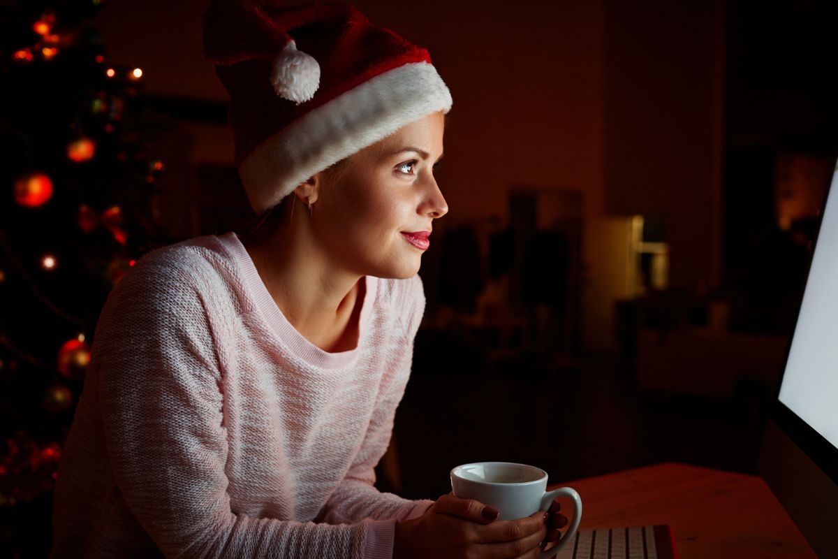 A picture of a woman watching a movie.