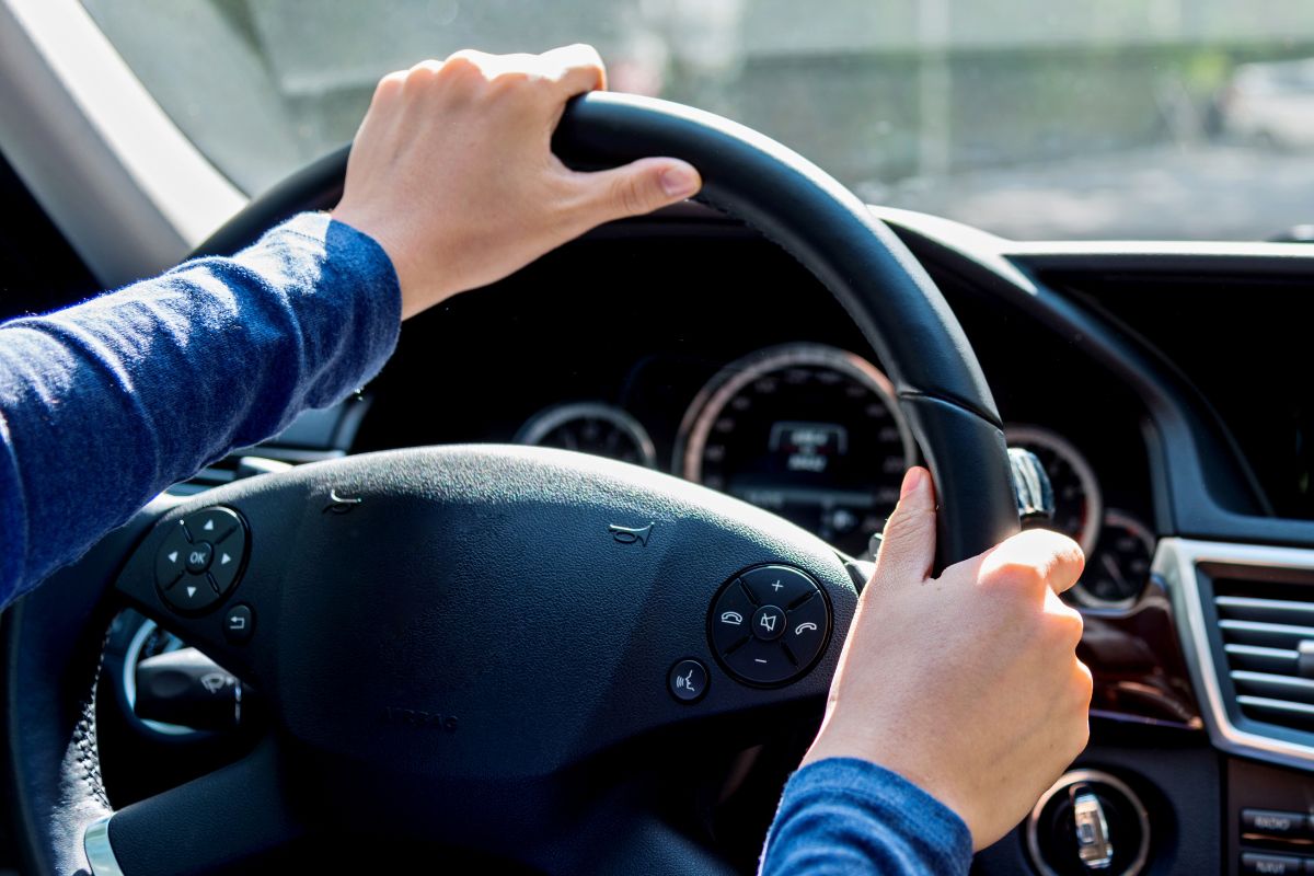 A picture of someone driving.