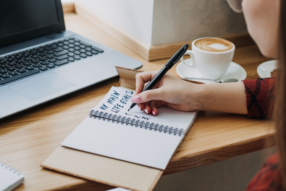 A picture of someone writing their life goals.