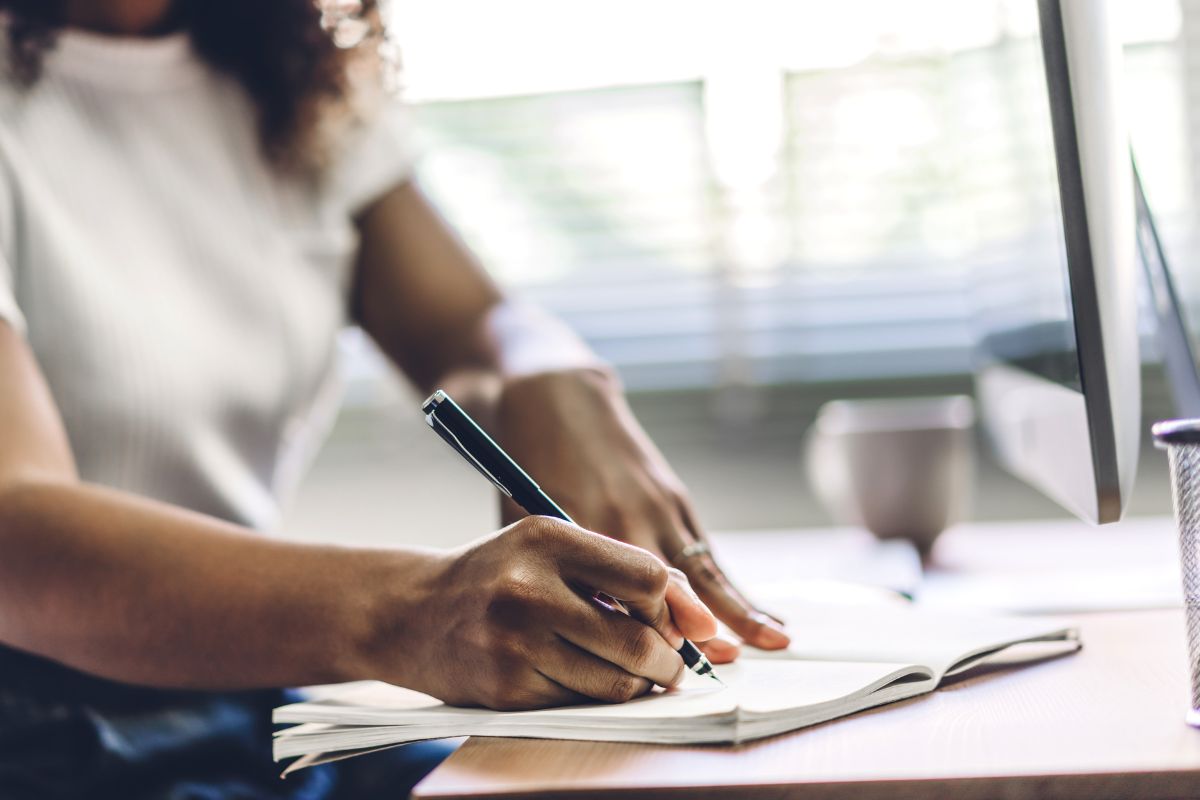 A picture of someone writing something,