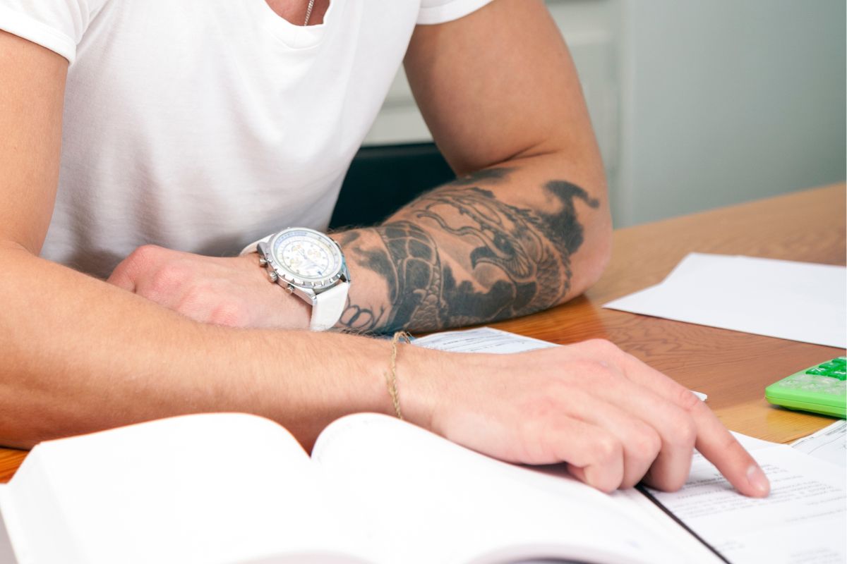 A picture of someone reviewing his finances.