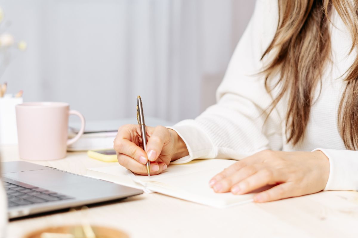 A picture of someone writing something.