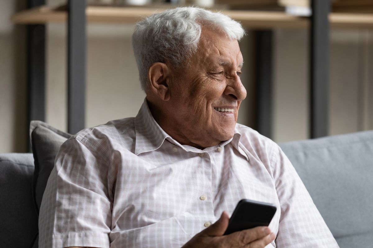 A picture of an elderly man smiling.