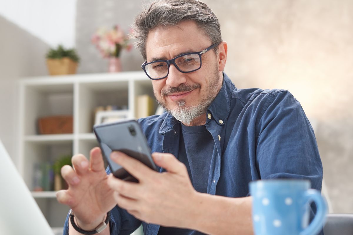 A picture of someone using their phone.