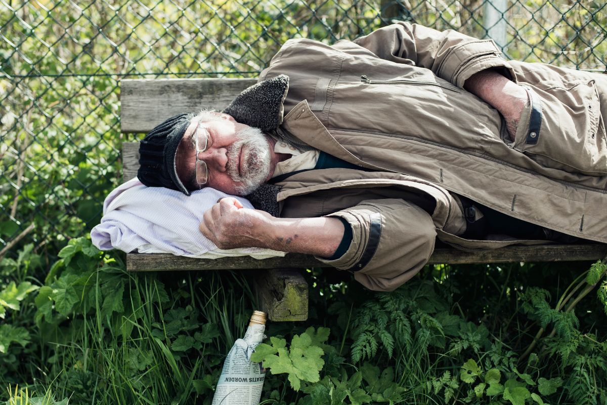 A picture of a homeless senior citizen.