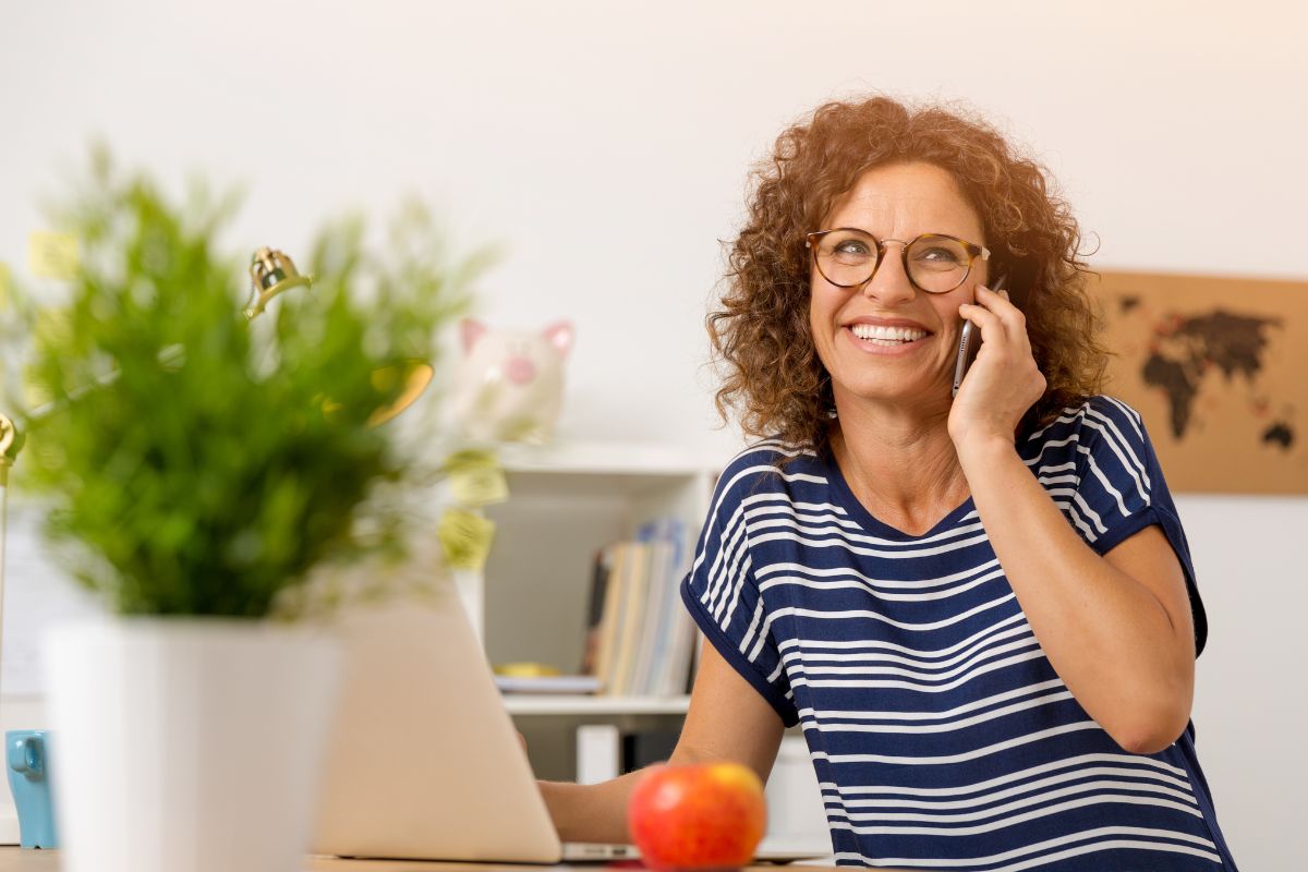 A picture of a woman making a phone call.