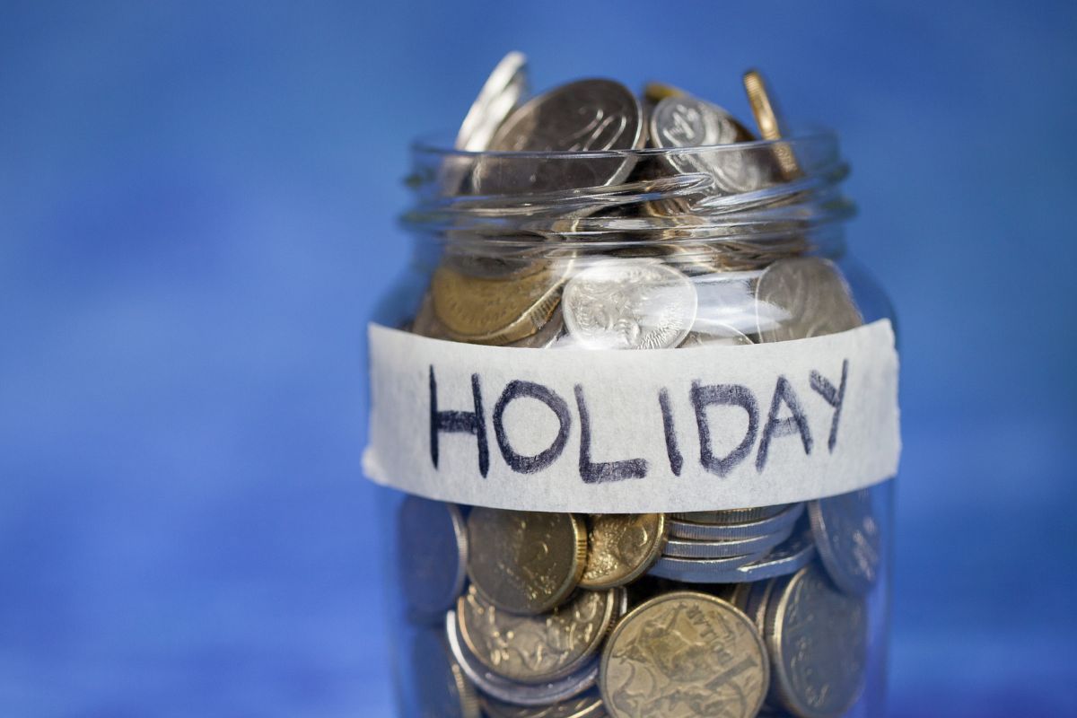 An image of a jar with coins and a holiday label.