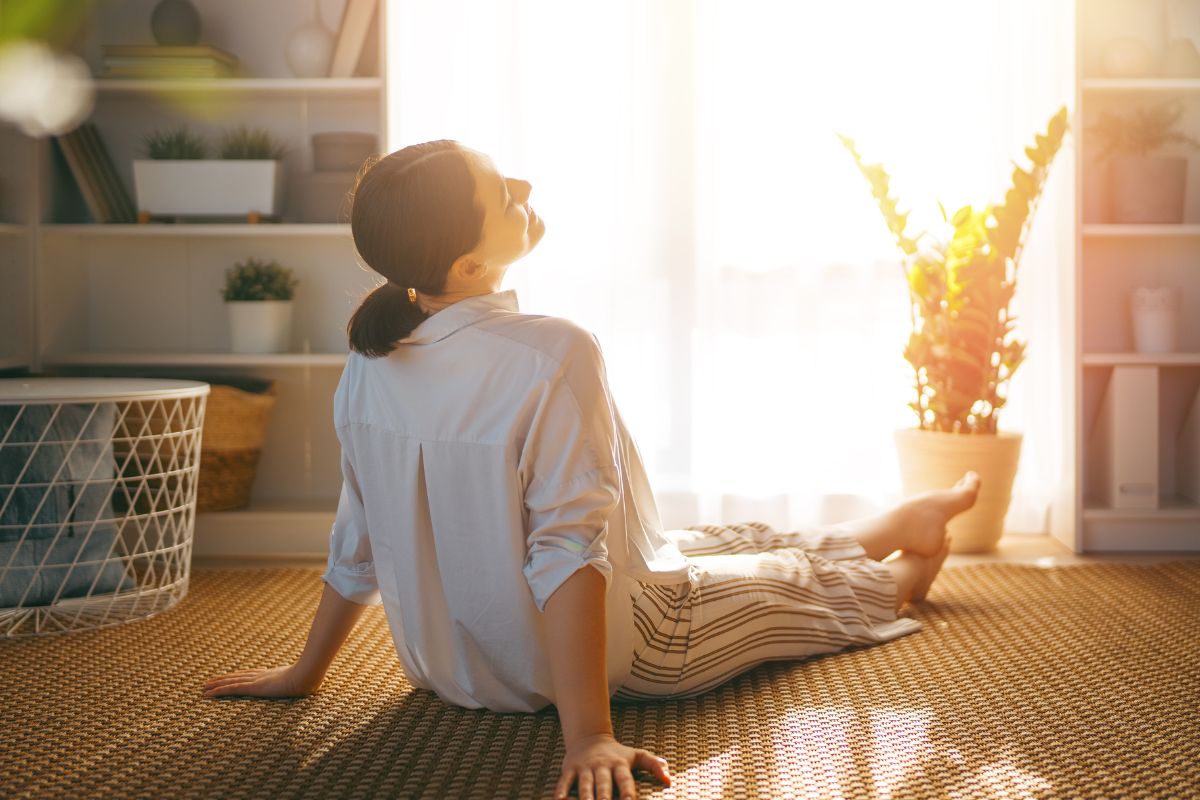 An image shows a woman relaxing.