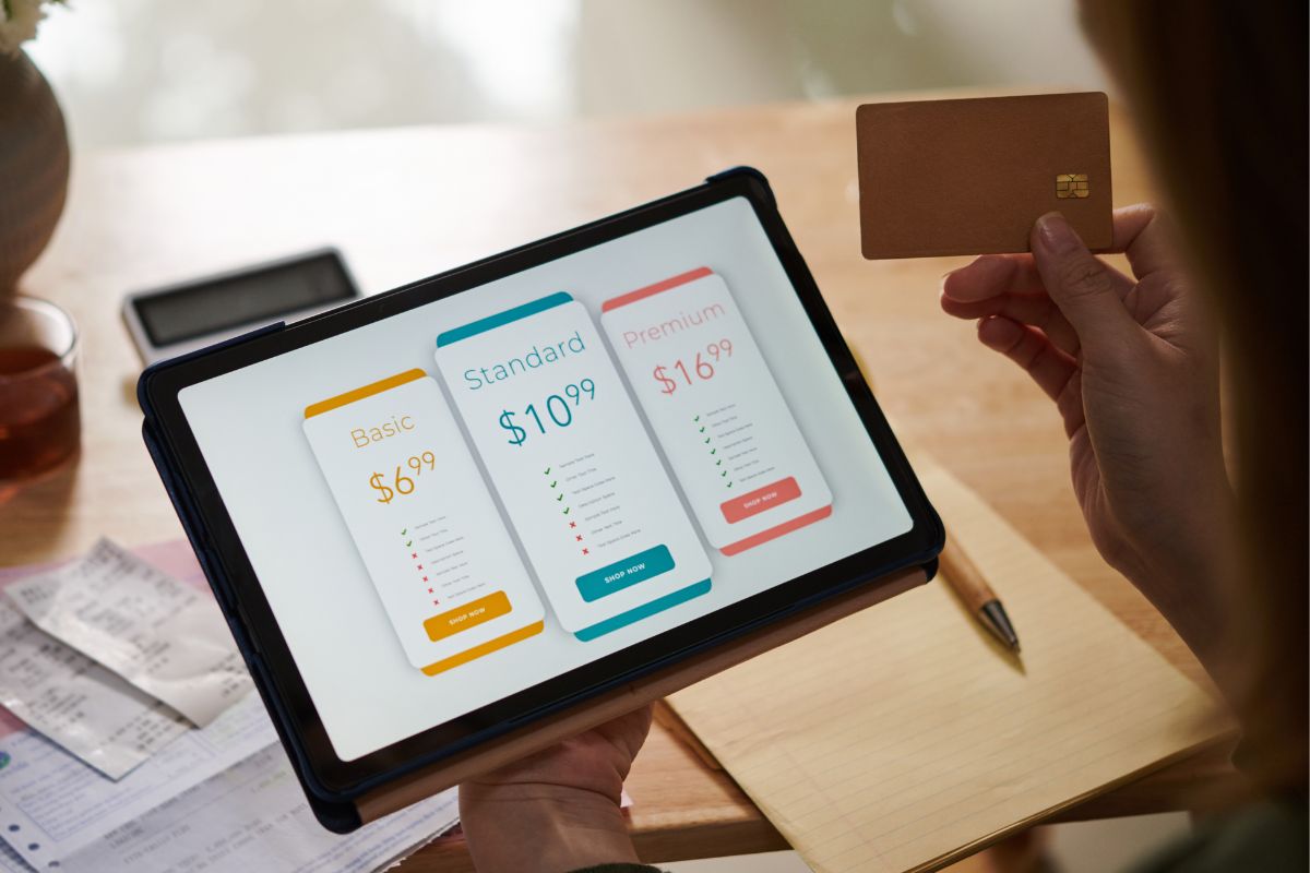 A picture of a woman is cutting her subscriptions.