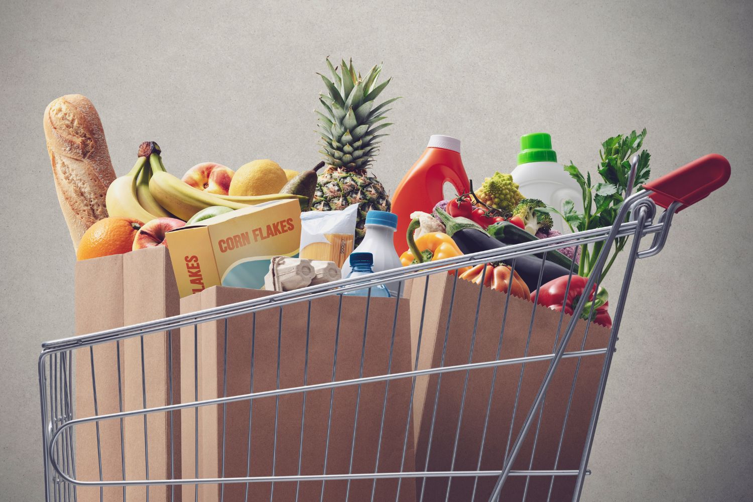 A picture shows a cart full of grocery products.