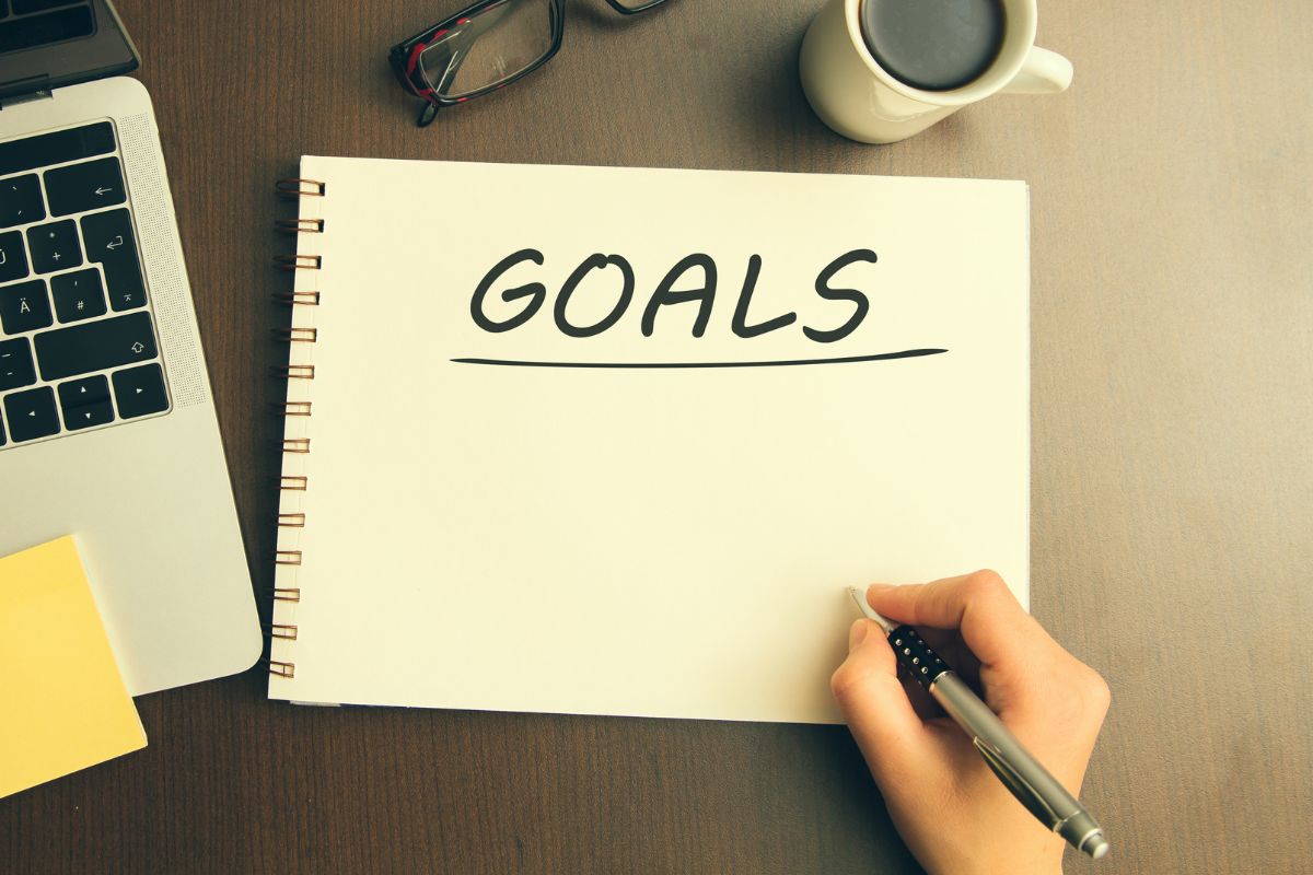 A picture tells about a woman’s hand making goals.