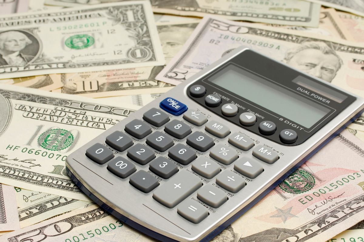 A picture of money and a calculator.