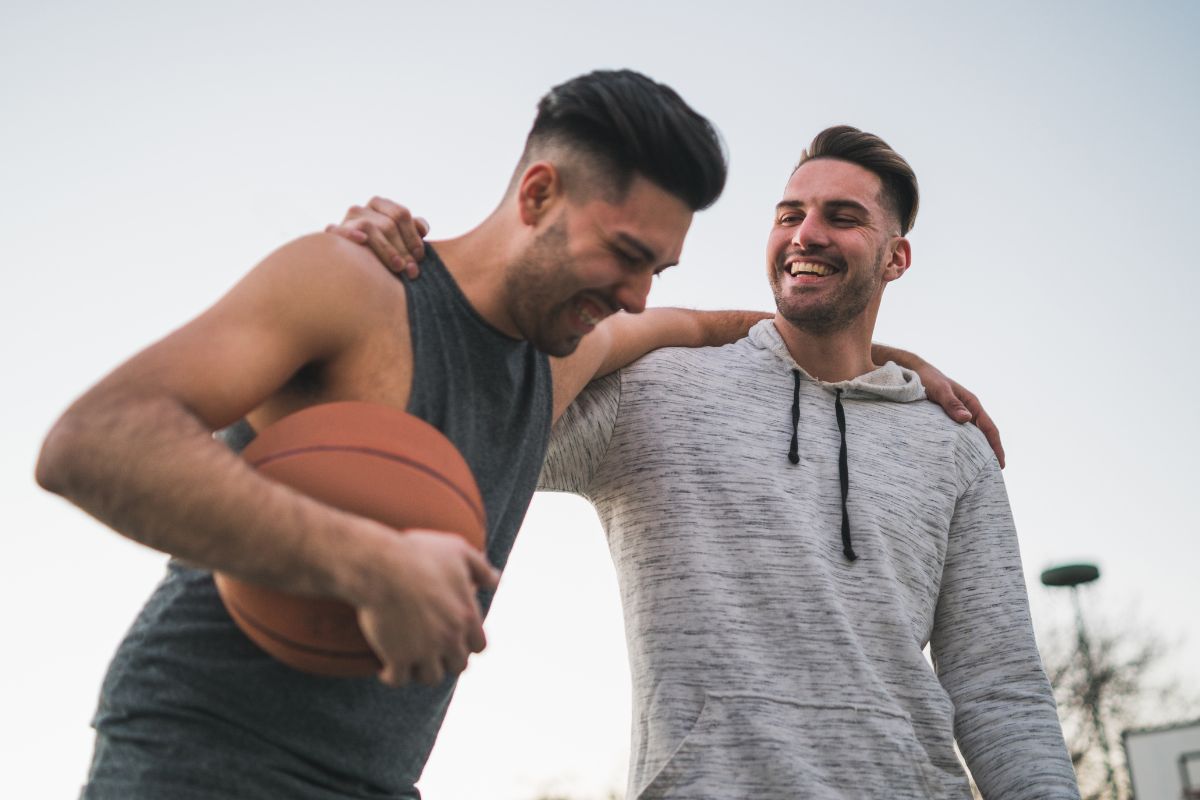 A picture shows men playing basketball.