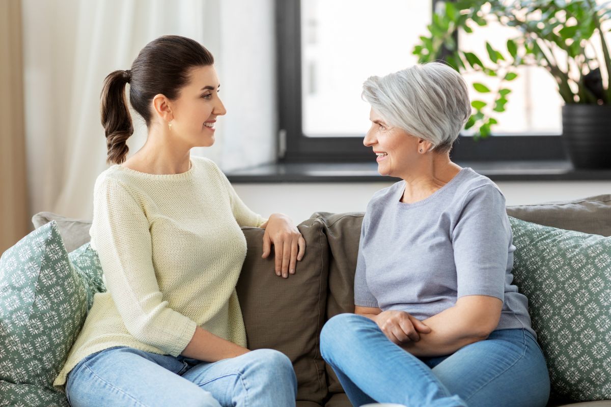 An image of a mother and daughter talking.