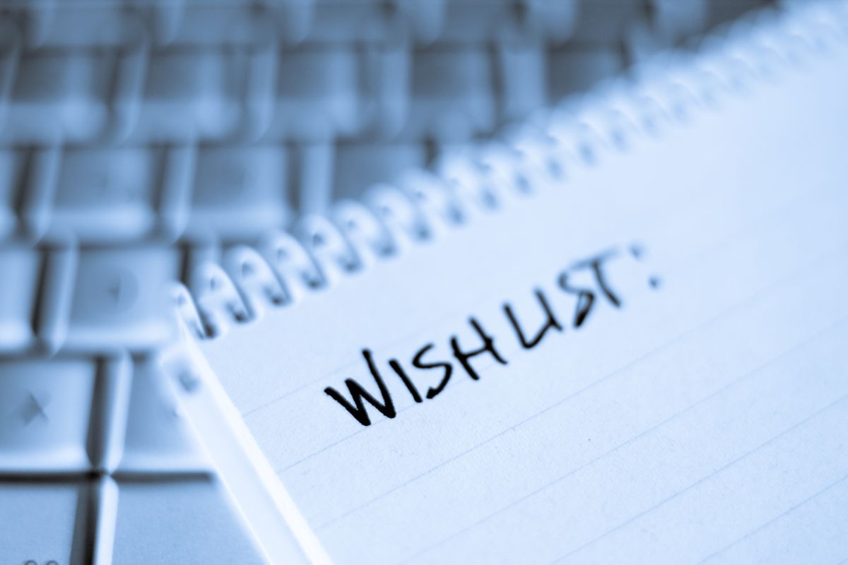 A picture shows a notebook with wishlist wording.