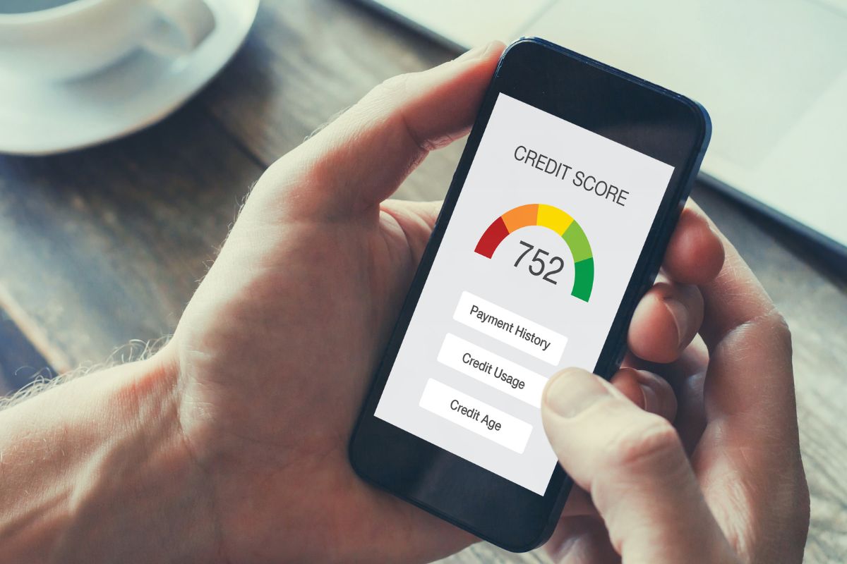 A picture shows a man checking his credit score.