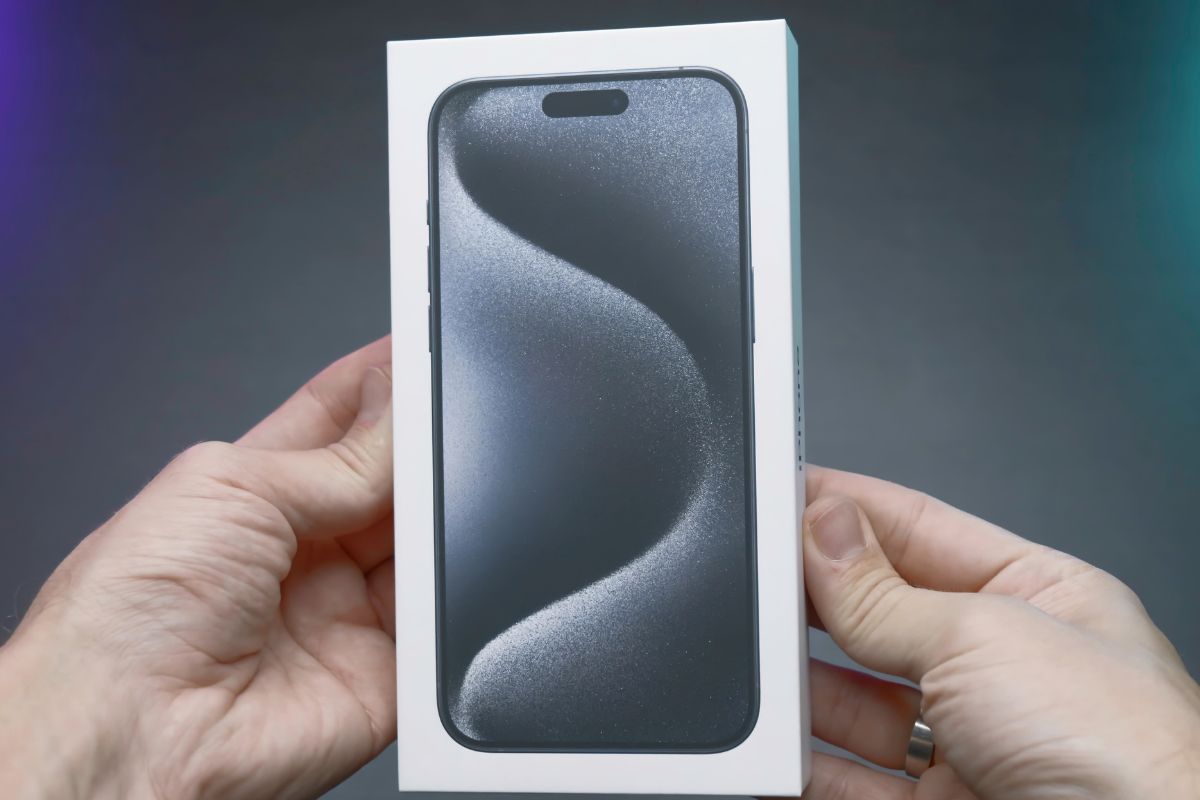 A picture shows a woman's hand holding a new phone.