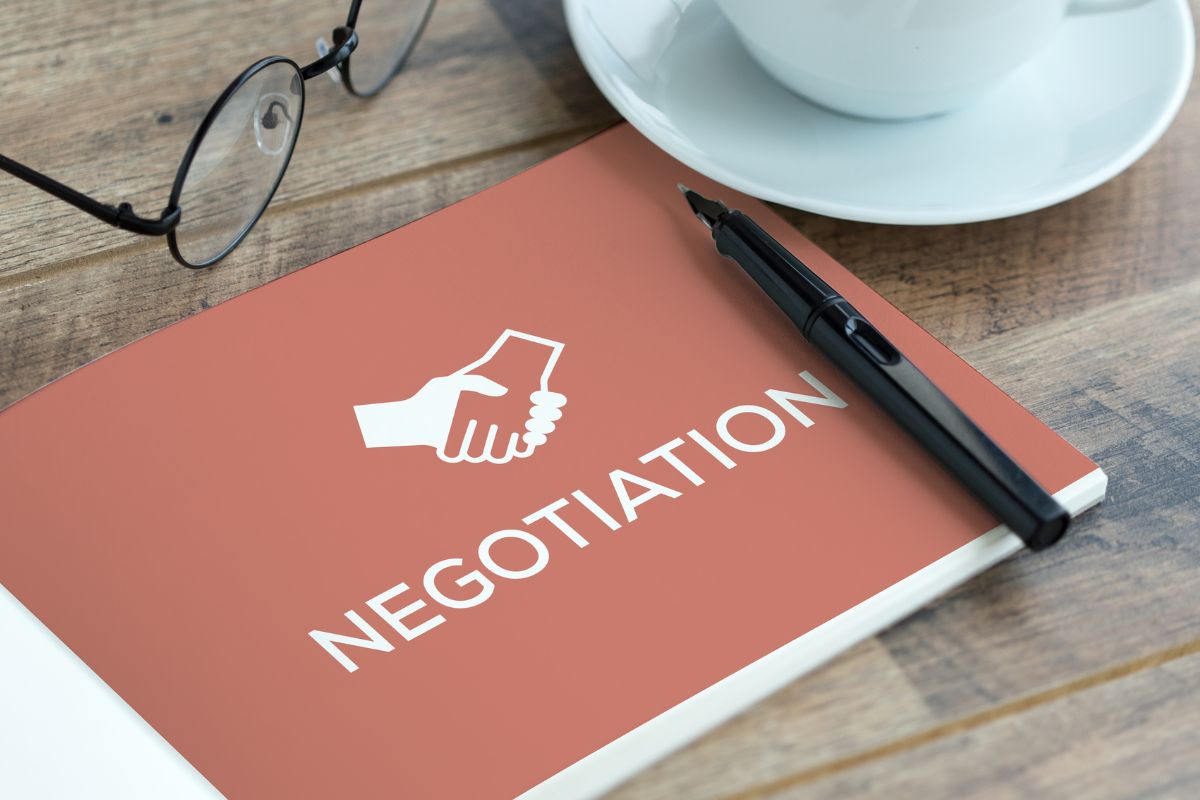 A picture shows a book on negotiation.