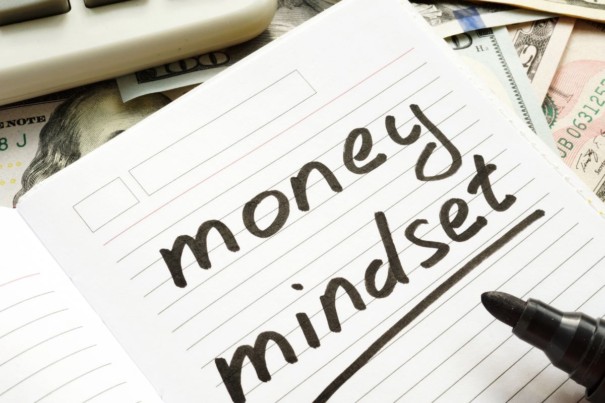 An image of a notebook with money mindset wording.