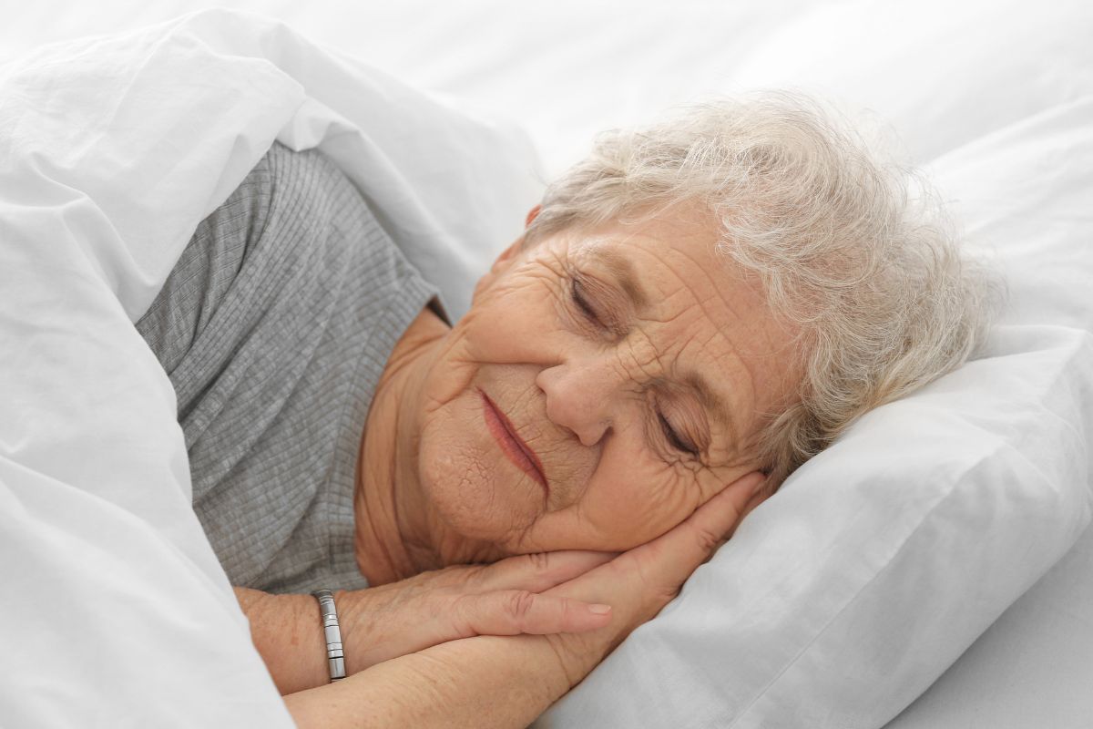 A picture of an elderly woman sleeping.