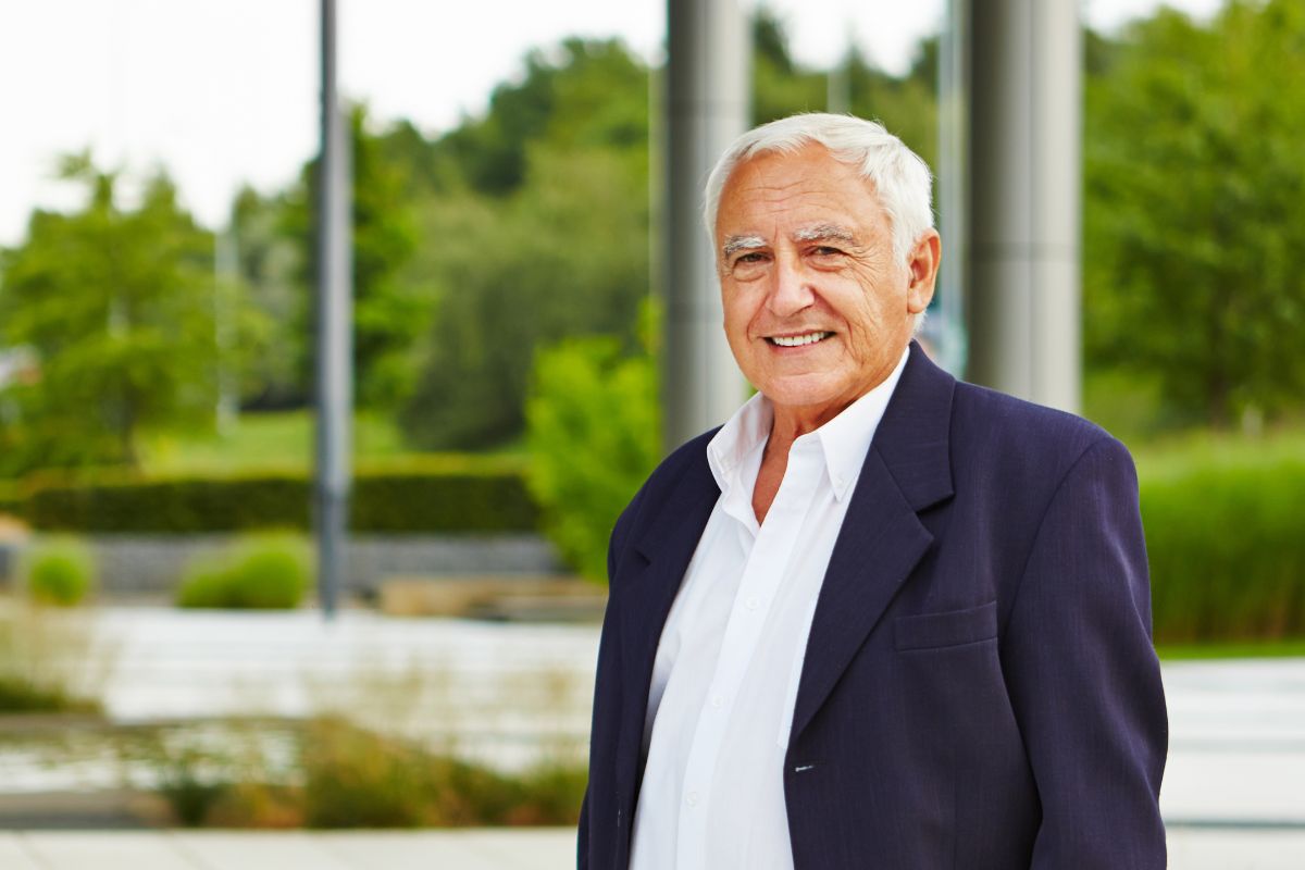 A picture of a smiling elderly man.