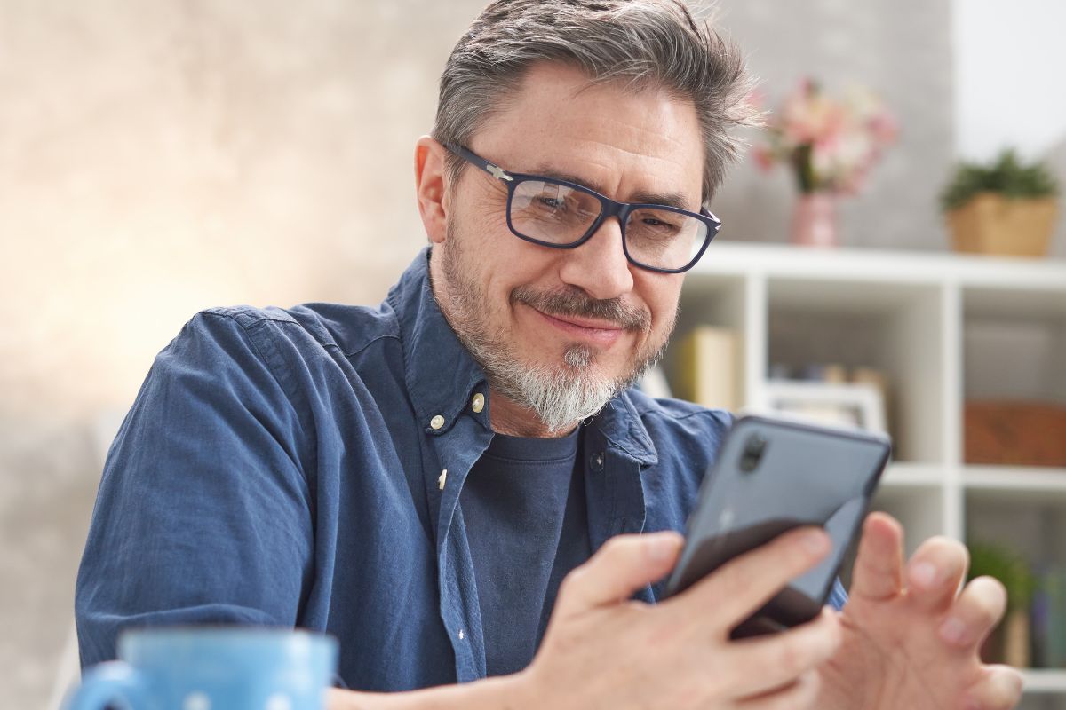 A picture of someone using their phone.