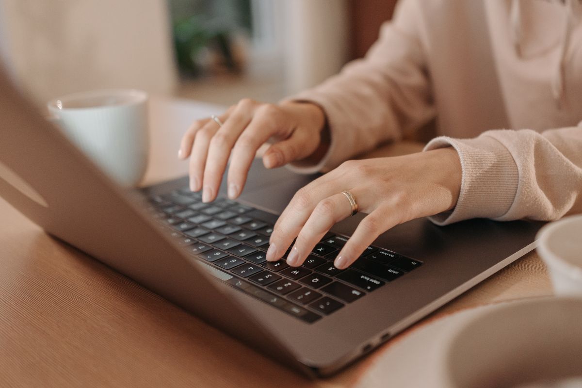 A picture of someone typing.