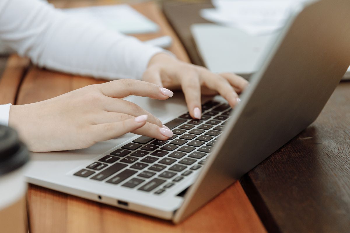 A picture of someone typing.