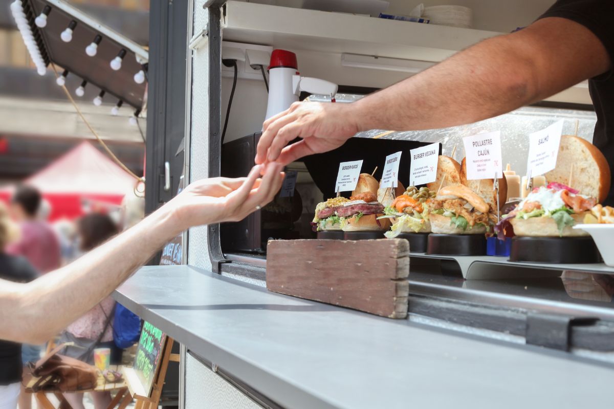 A picture of someone selling food.