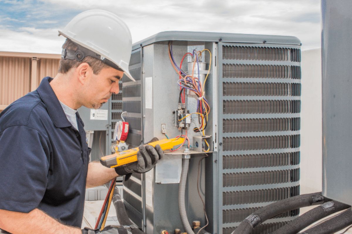 A picture of an HVAC technician.