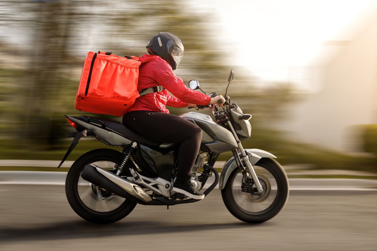 A picture of someone delivering something.