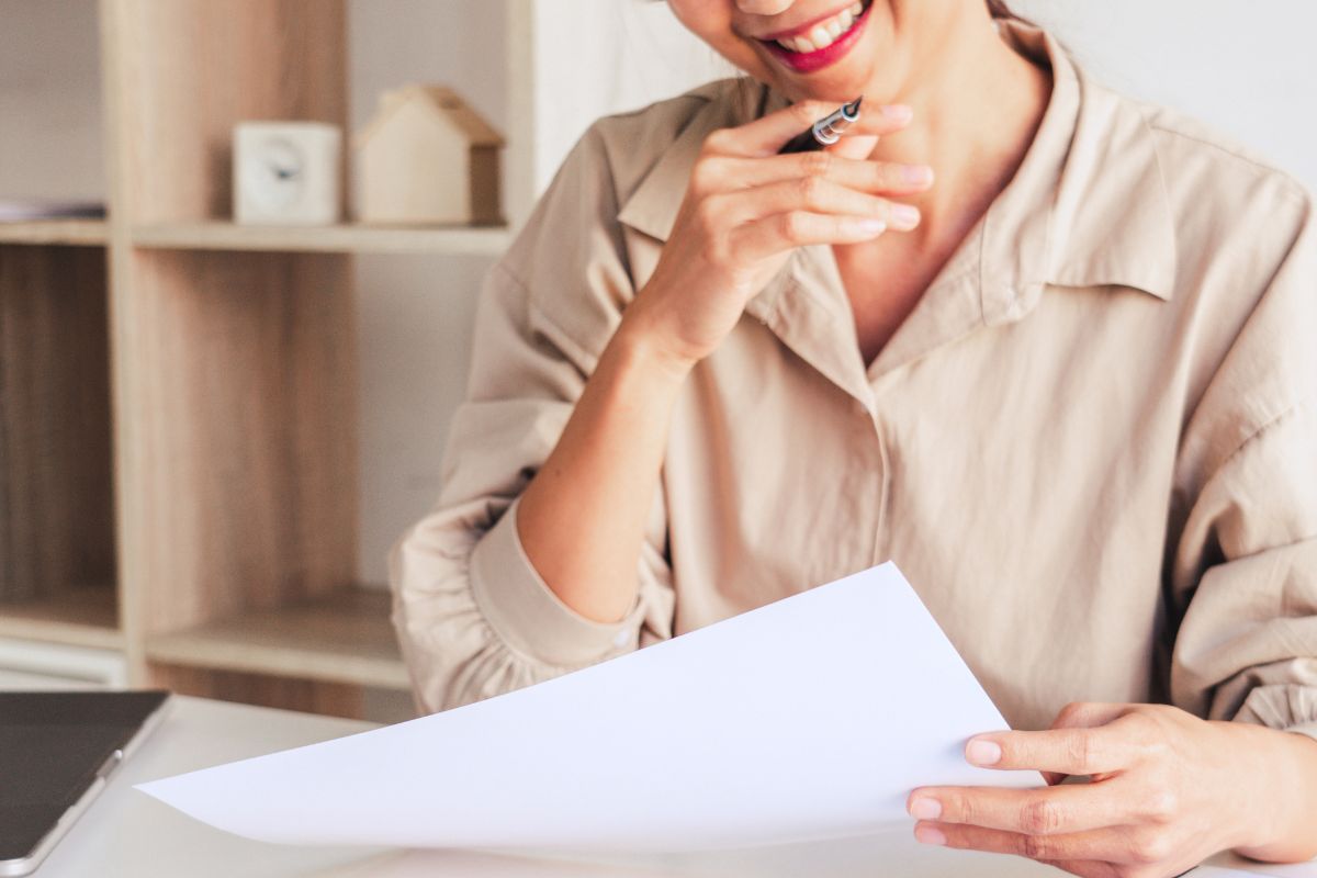 A picture of someone reviewing papers.