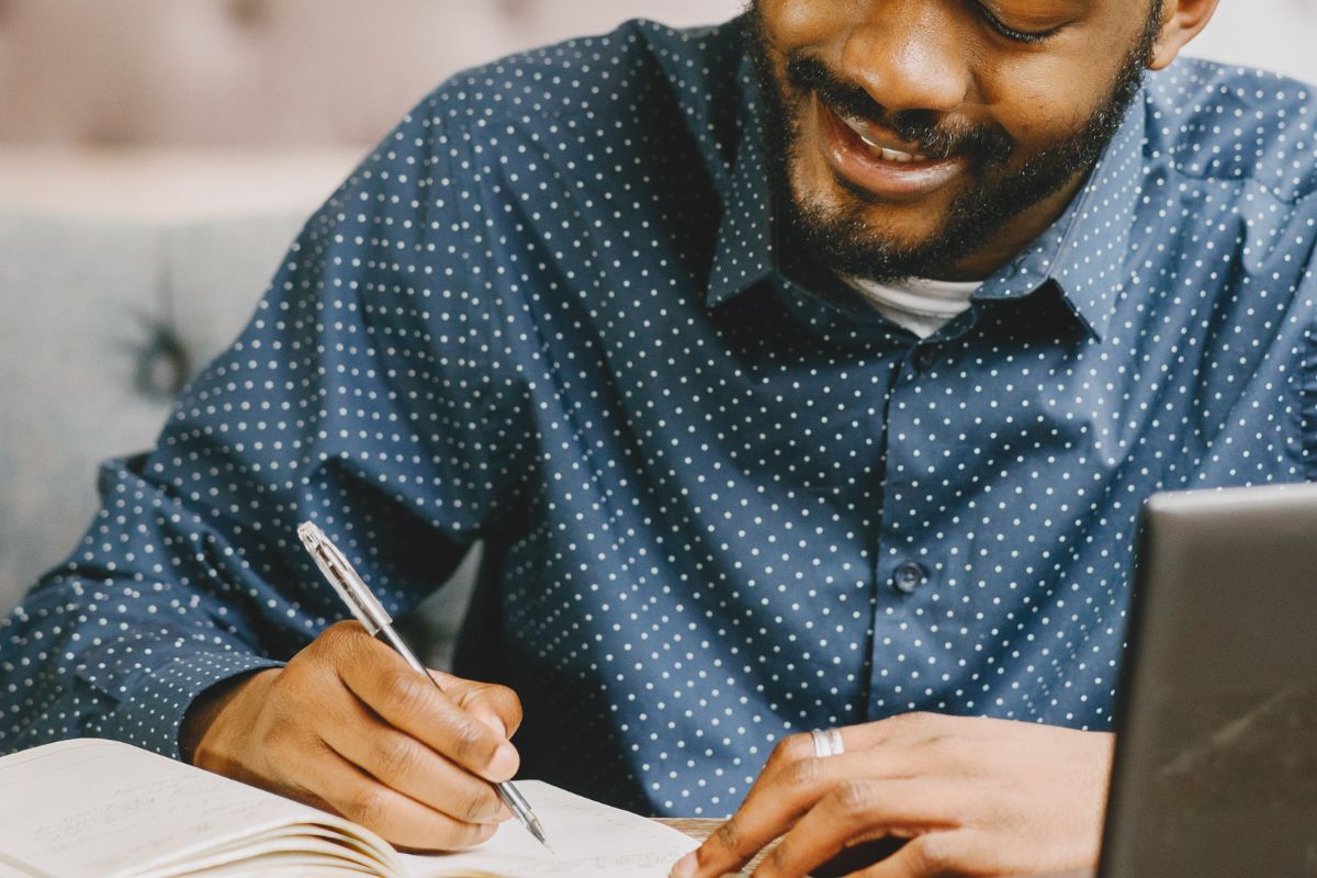 A picture of someone writing.
