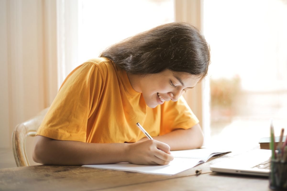 A picture of someone writing.