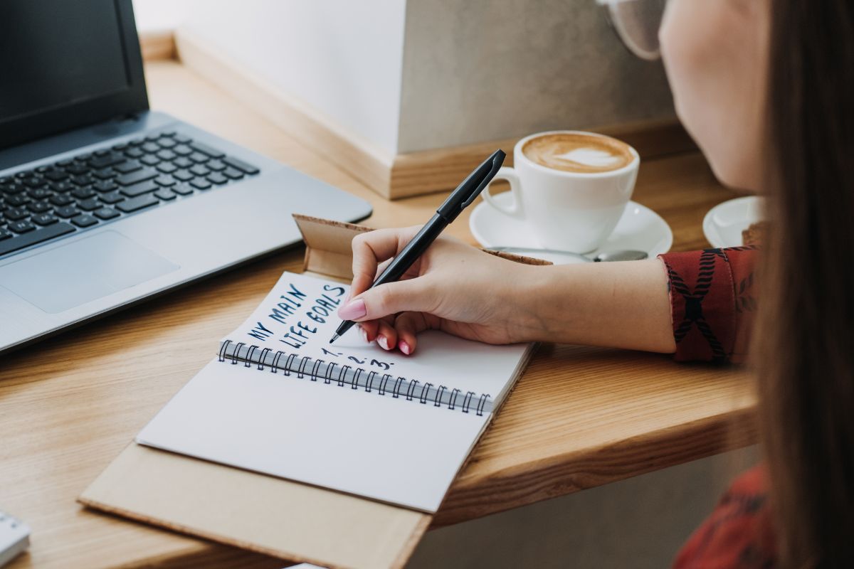 A picture of someone writing their life goals.