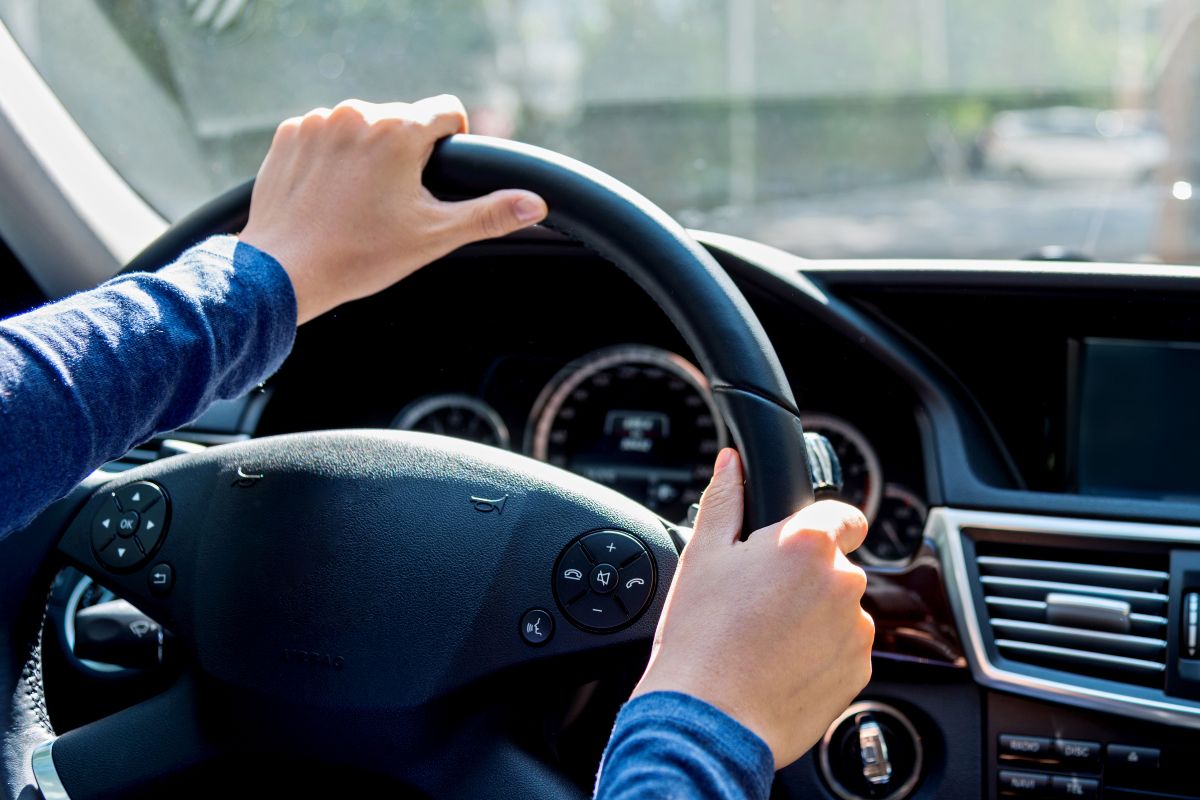 A picture of someone driving.