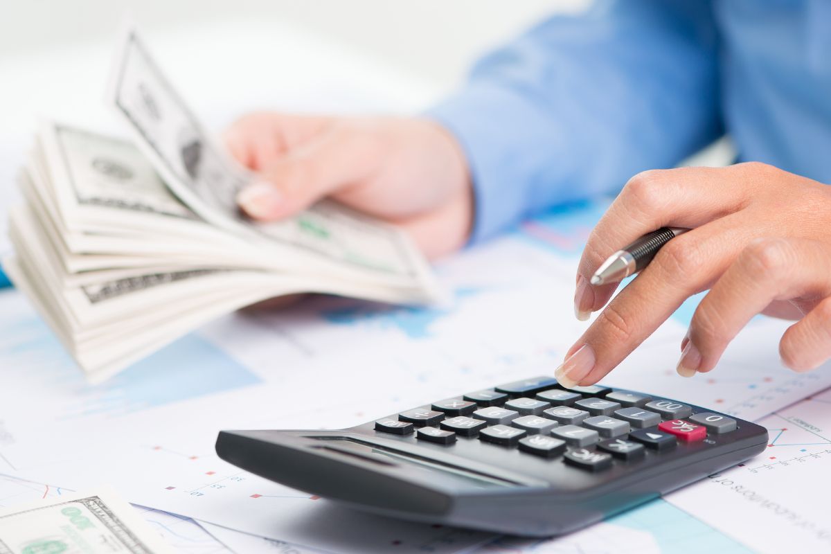 A picture of someone counting money.
