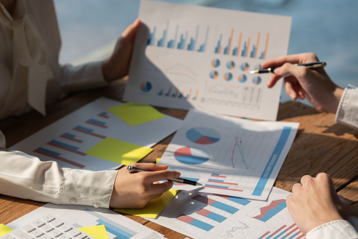 A picture of someone with graphs.