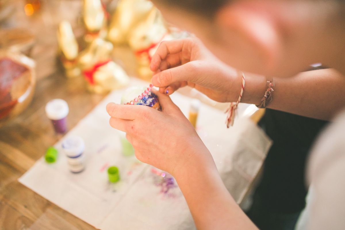 A picture of friends making something.