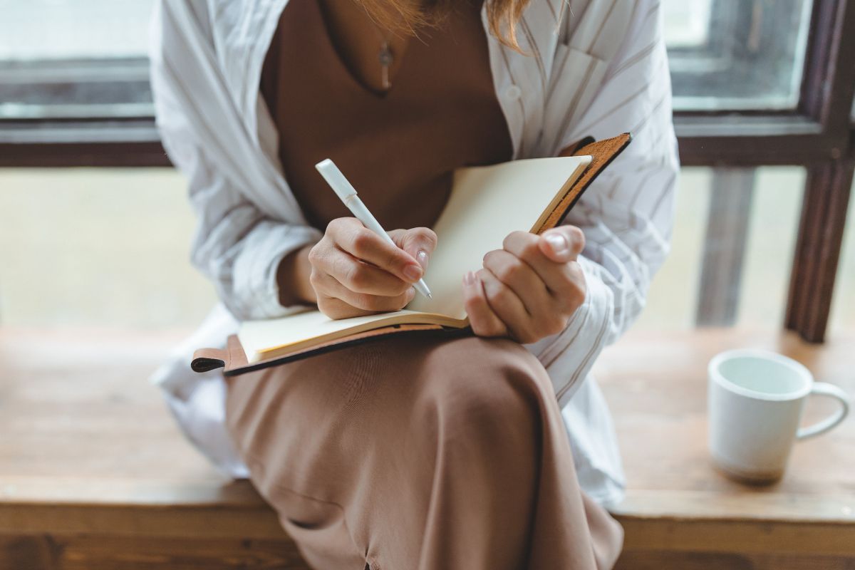 A picture of someone writing something.
