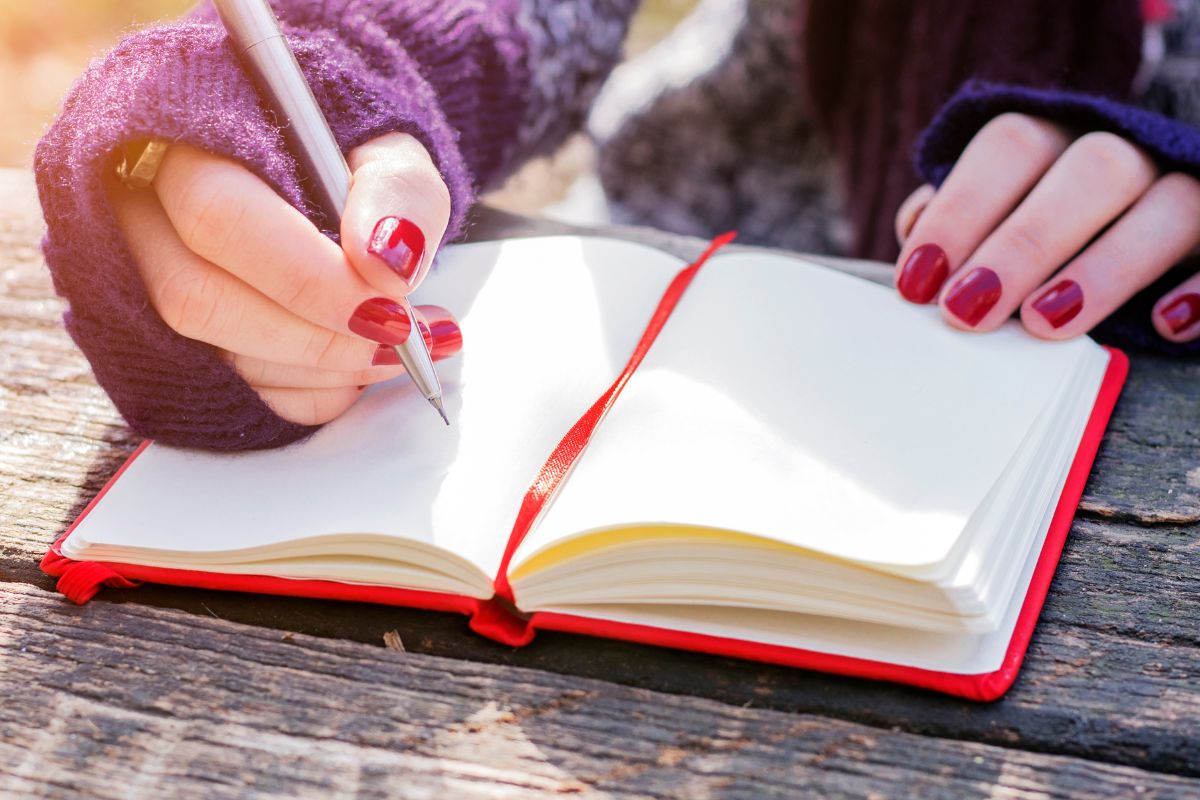 A picture of someone writing.