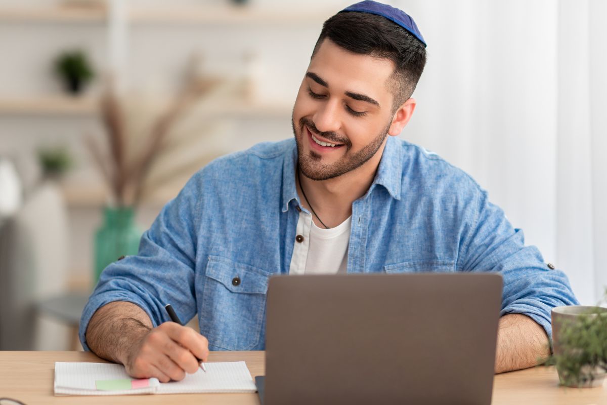 A picture of someone writing.