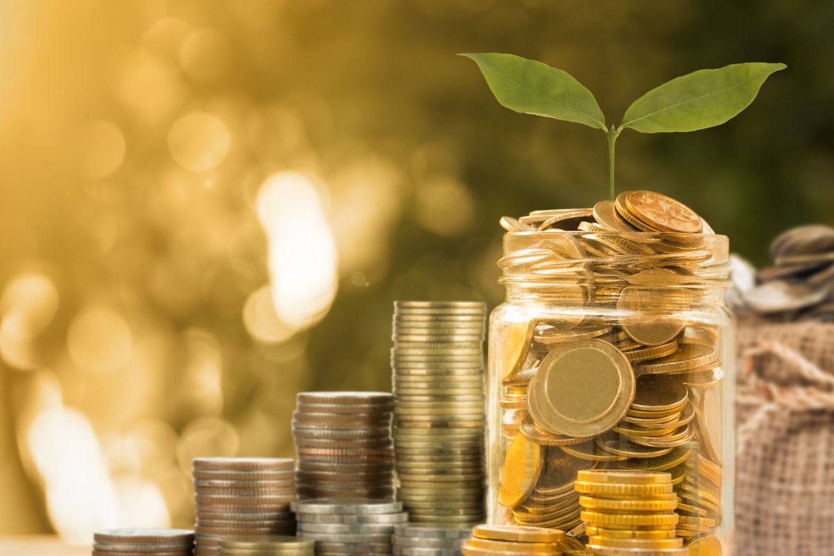 A picture of a jar full of money.