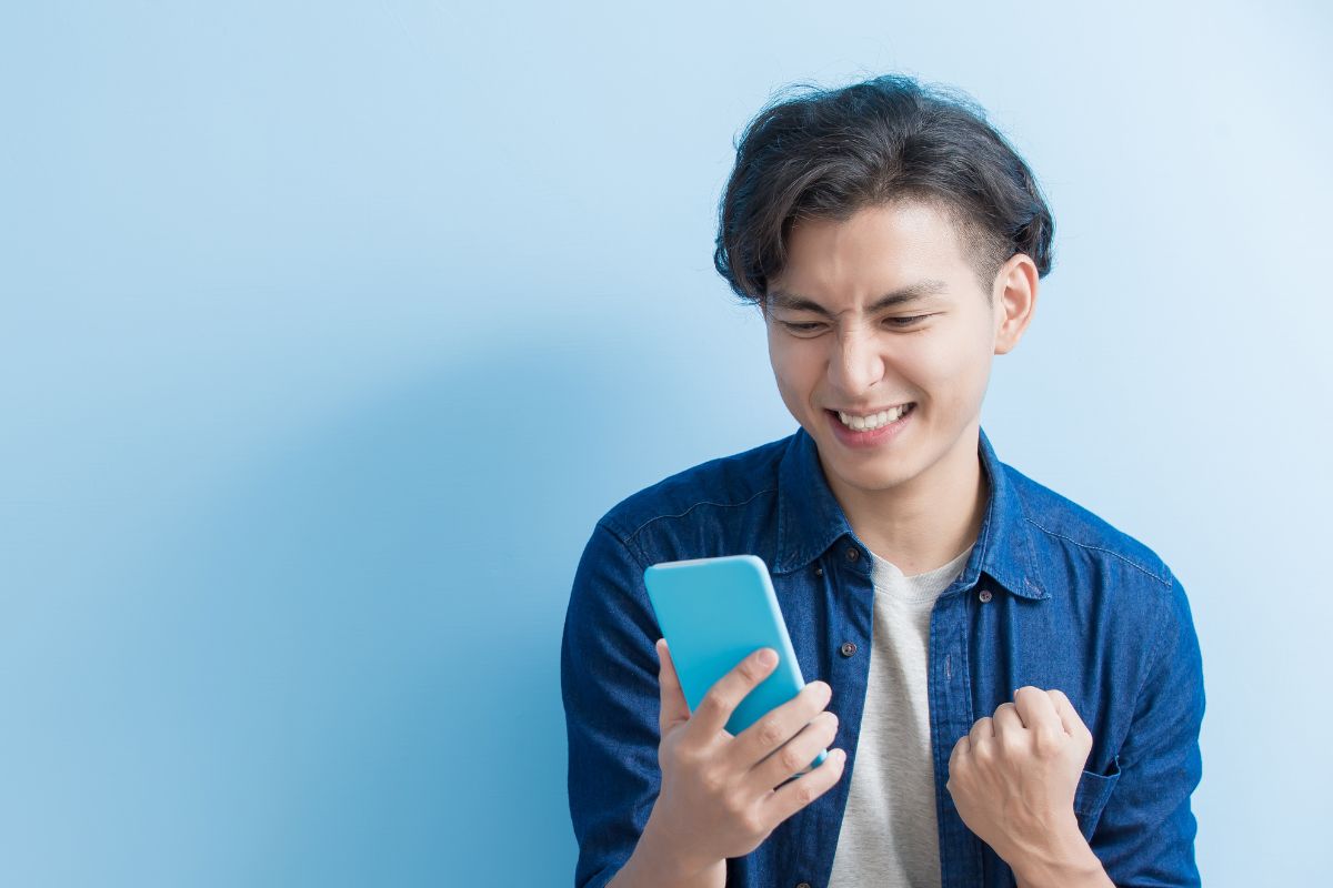 A picture of someone using their phone.