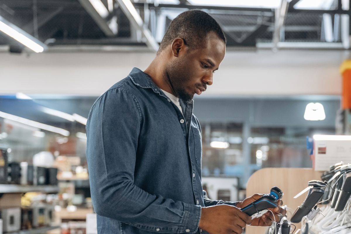 A picture of someone looking for an appliance.