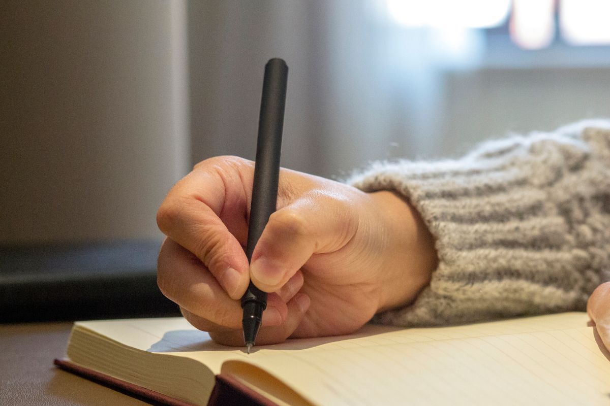 A picture of someone writing something.