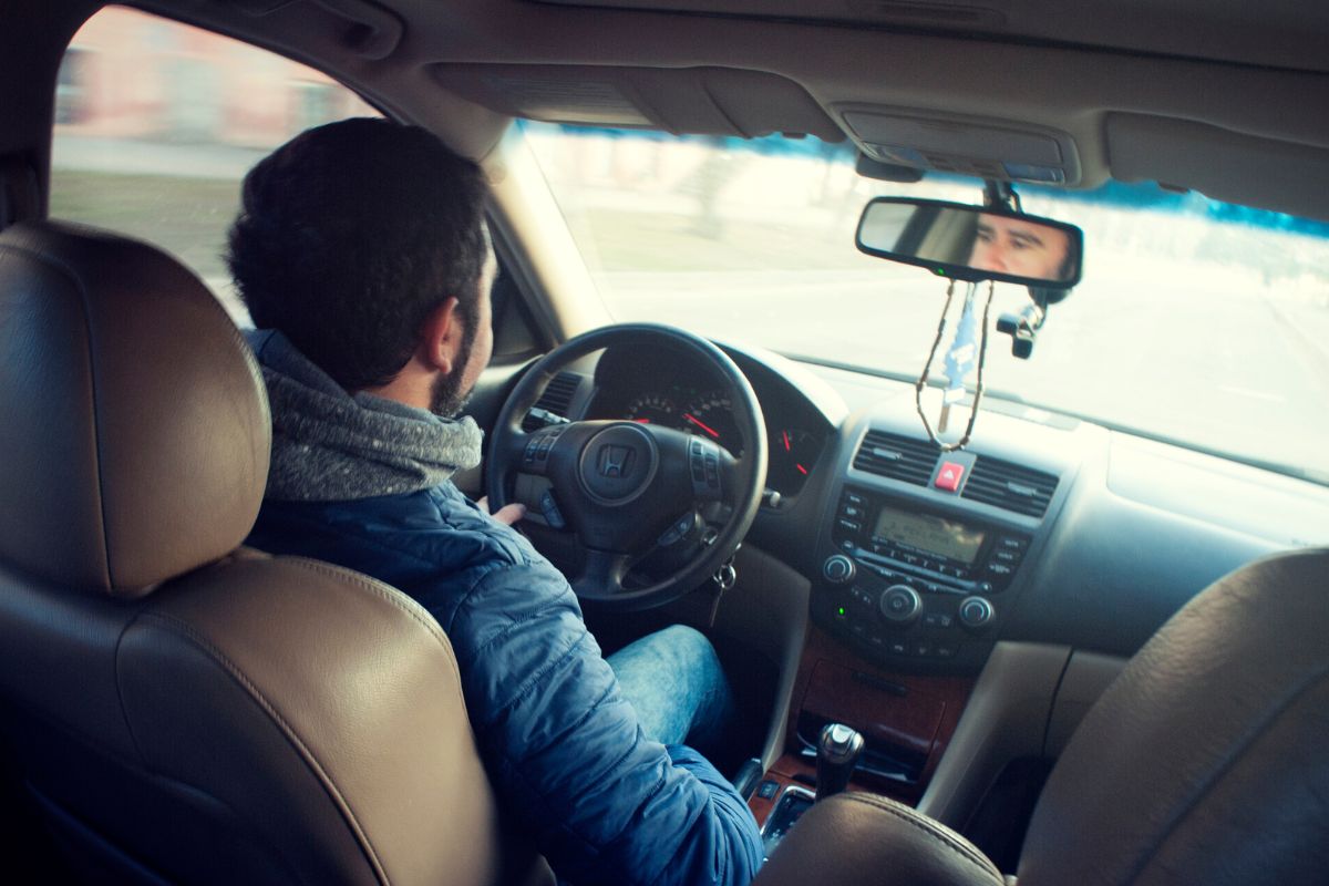 A picture of someone driving.