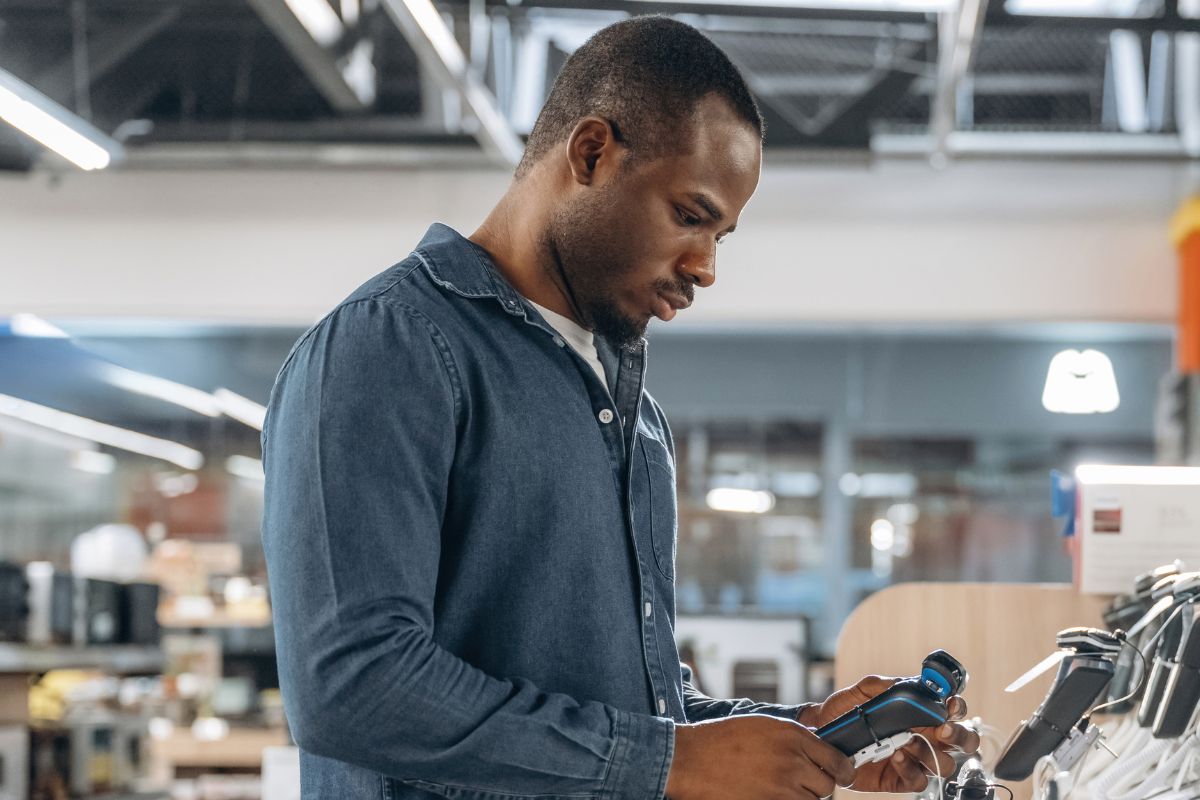 A picture of someone looking for an appliance.