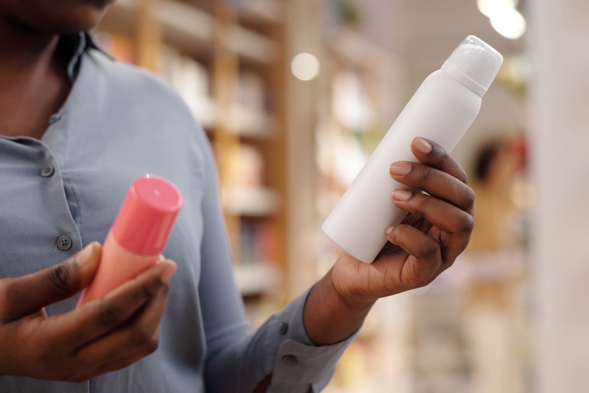 A picture of someone comparing prices.