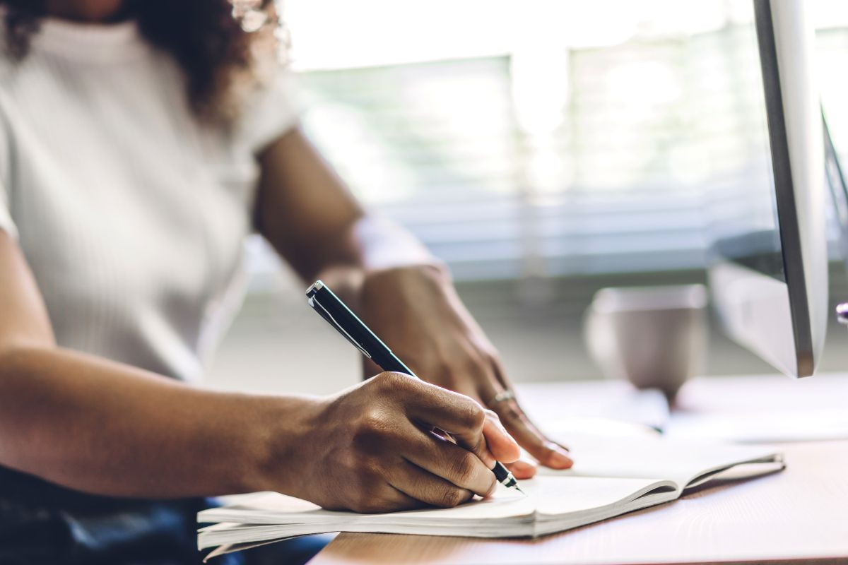 A picture of someone writing something.